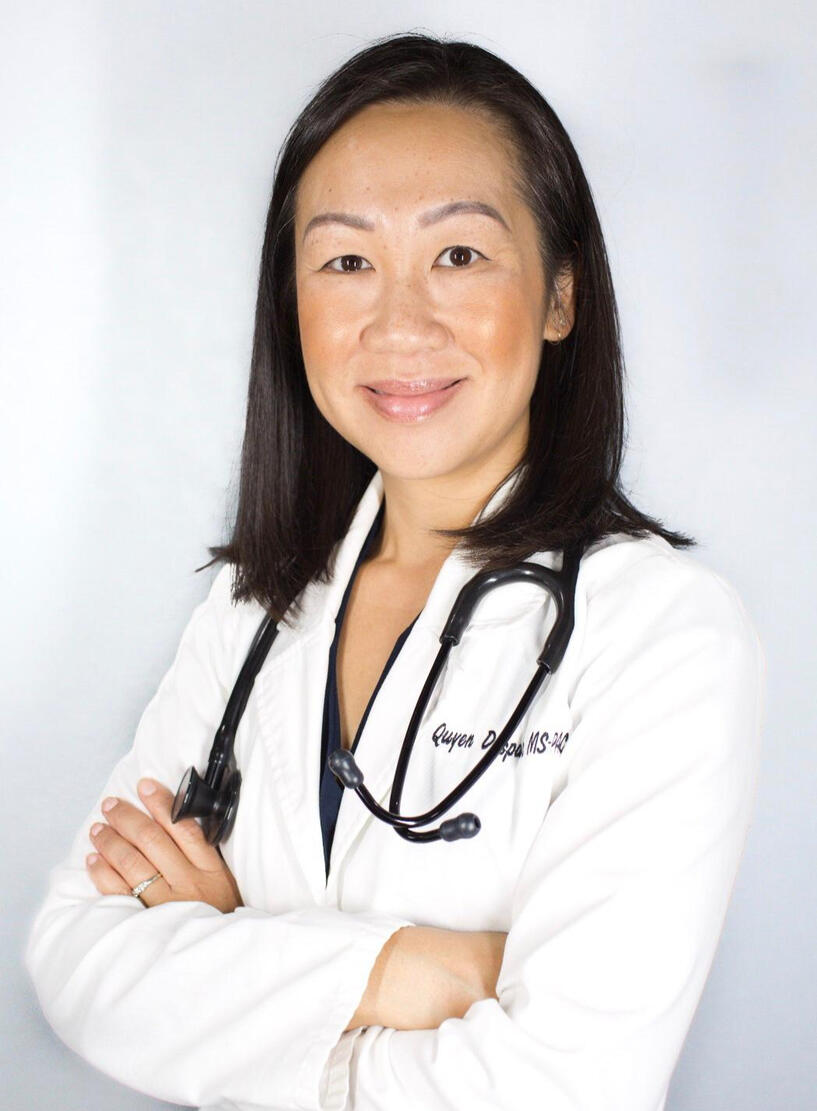 Portrait of Quyen Despas, a Physician Assistant, smiling and wearing a white lab coat with a stethoscope around her neck. Next to her photo is a brief biography stating her education background, experience, and dedication to serving diverse communities in